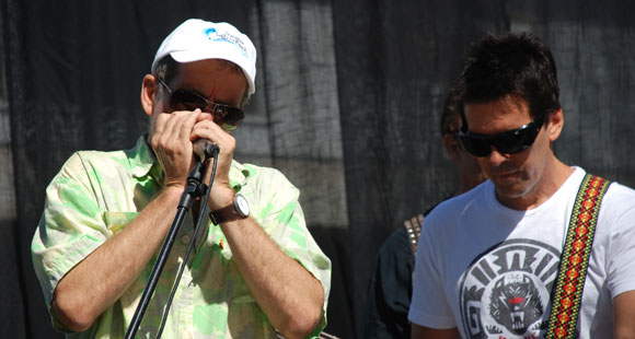 Billy Fried, Founder of Laguna La Vida, chimes in with harmonica during the Nick I concert
